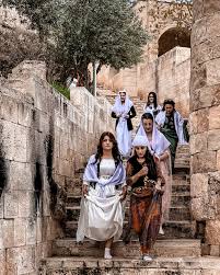 Kurdish heritage clothing in an old stone village